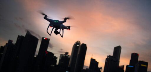 drone facing multiple building