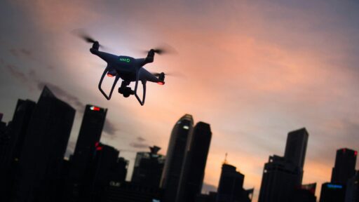 drone facing multiple building
